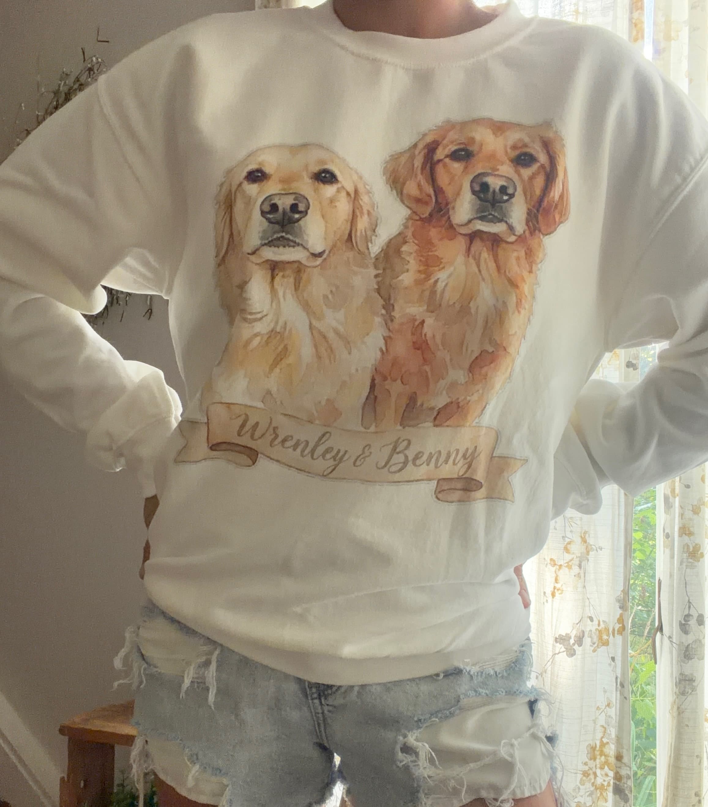 Custom watercolor pet portraits printed on a white crewneck